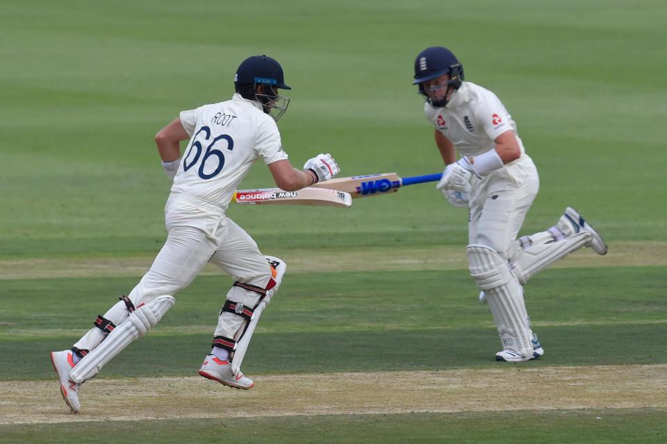 Steadying the ship: Joe Root and Ollie Pope (AFP via Getty Images)