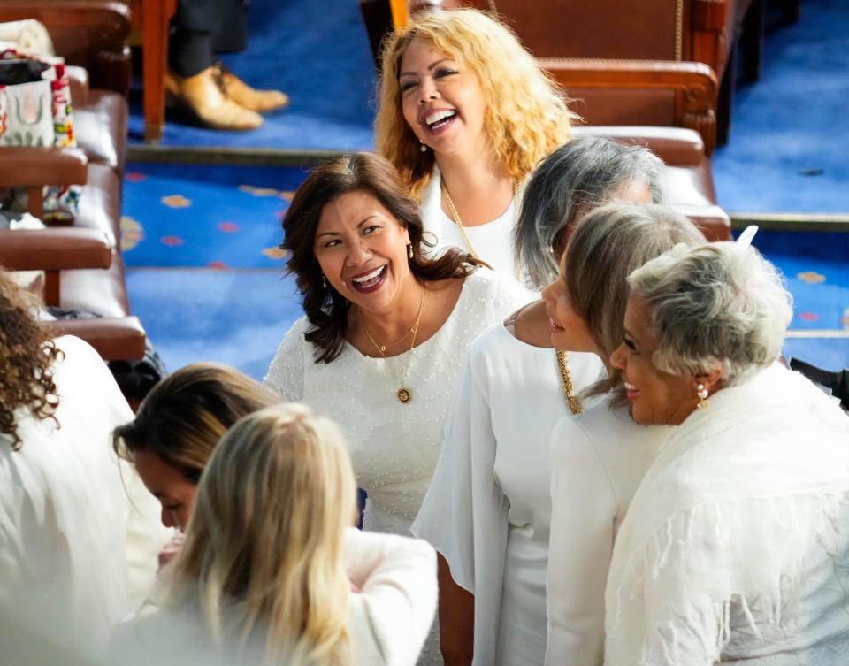 Rep. Norma Torres, D-Calif., center, and Rep. Lucy McBath, D-Ga., top, wear white to support reproductive rights before President Joe Biden delivers the State of the Union address to Congress at the U.S. Capitol in Washington March 7, 2024.