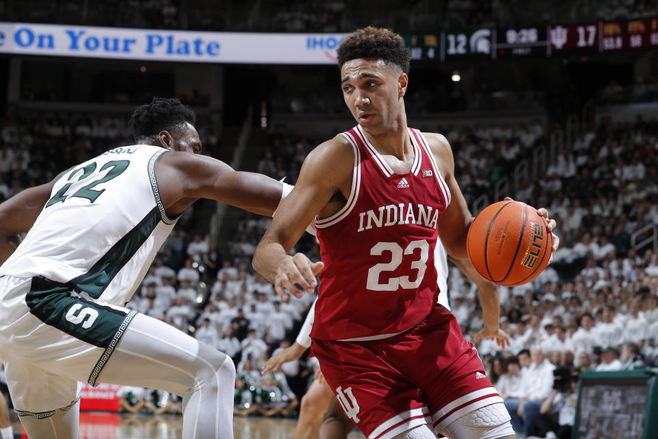 Indiana's Trayce Jackson-Davis, right, drives against Michigan State's Mady Sissoko during the first half of an NCAA college basketball game, Tuesday, Feb. 21, 2023, in East Lansing, Mich. (AP Photo/Al Goldis)