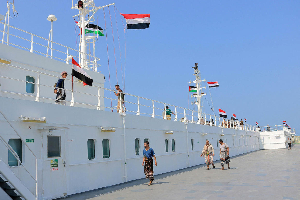 An organized tour by Yemen's Huthi rebels (on board) on Nov. 22, 2023 shows the Galaxy Leader cargo ship, seized by Huthi fighters two days earlier, docked in a port on the Red Sea in the Yemeni province of Hodeida. (AFP via Getty Images)