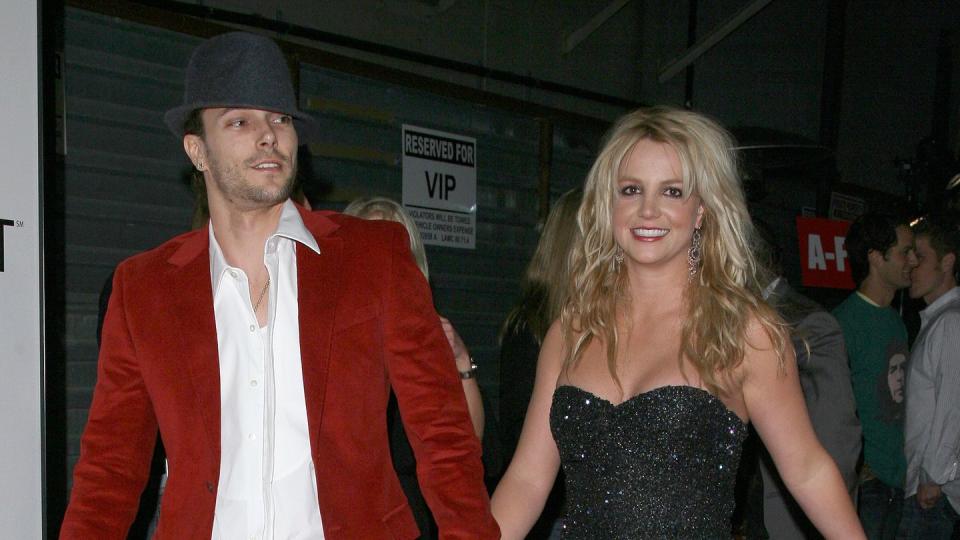 britney spears smiling as she walks and holds hands with kevin federline