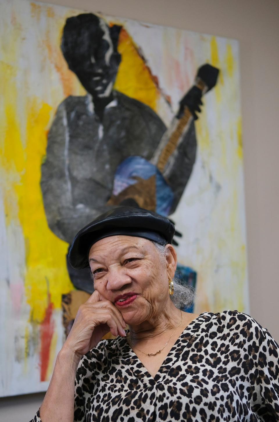 Anita Arnold is the executive director of Oklahoma City's Black Liberated Arts Center. Behind her is a painting of Charlie Christian, legendary jazz guitarist with the Benny Goodman orchestra — "the greatest musician ever to come out of Oklahoma, African American or otherwise," she says.