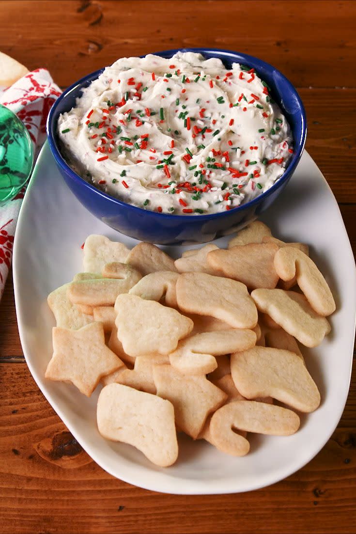 <p>Frosting sugar cookies can be such a pain, with all those piping bags and food coloring. Make life easier on yourself and pair sugar cookies with this easy dip instead! Make our <a href="https://www.delish.com/cooking/recipe-ideas/recipes/a50502/basic-sugar-cookies-recipe/" rel="nofollow noopener" target="_blank" data-ylk="slk:perfect sugar cookies;elm:context_link;itc:0;sec:content-canvas" class="link ">perfect sugar cookies</a> to go with it, or just use store-bought (no judgment!).</p><p>Get the <strong><a href="https://www.delish.com/holiday-recipes/christmas/a25563100/frosted-sugar-cookie-dip-recipe/" rel="nofollow noopener" target="_blank" data-ylk="slk:Frosted Sugar Cookie Dip recipe;elm:context_link;itc:0;sec:content-canvas" class="link ">Frosted Sugar Cookie Dip recipe</a>.</strong></p>