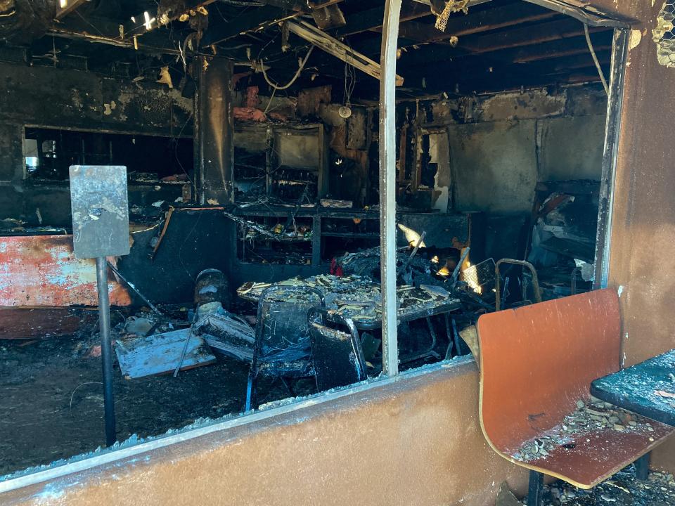 Broken windows and shattered glass were part of the aftermath Wednesday, Nov. 10, 2021, after a fire burned inside the Casa Delicias restaurant in Hesperia.