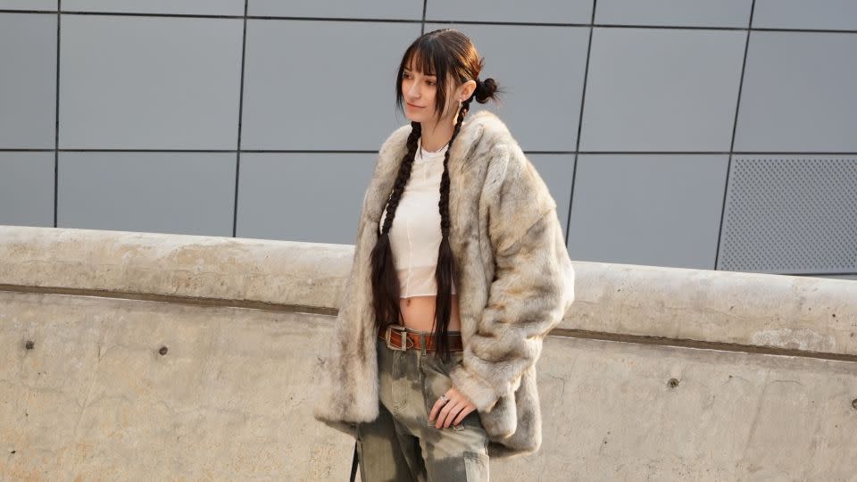 Jade Bachalas wore a second-hand fur jacket from Seoul's Dongmyo Flea Market. “I wanted a cowboy vibe for this look — with a bit of Y2K.” - Kahyun Lee/CNN