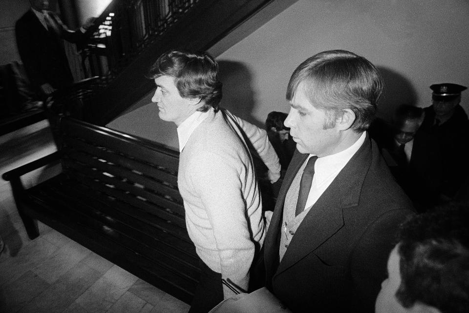 Norman Johnston, left, and his brother David Johnston enter a Cambria County courtroom at Ebensburg, Penn., March 19, 1980. They were found guilty of four of five murder charges against them. Prosecutors say the murders were carried out to protect a lucrative family crime ring. / Credit: R.C. Greenawalt / AP