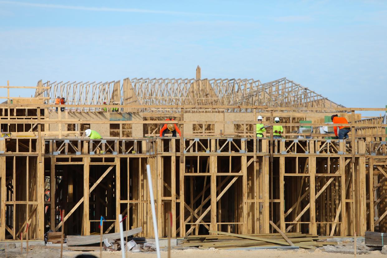 Construction crews continue work on several apartment buildings being built off SW 17th Road and Tower Road near the attached to the Grand Oaks Subdivision in Gainesville, Fla. October 1, 2021.