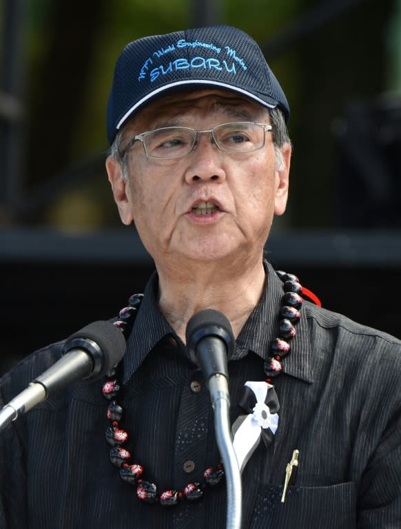 Okinawa governor Takeshi Onaga gives an address during a rally against the US military presence in Naha, Okinawa prefecture, on June 19, 2016