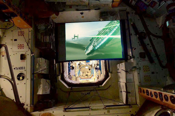 Coming to an off-the-Earth film screen: the astronauts aboard the International Space Station will watch Star Wars.