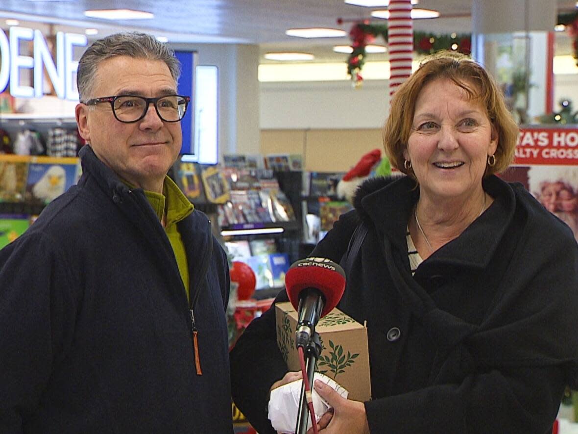Clarence and Judy Burke say they're ready for a vacation. (Ken Linton/CBC - image credit)