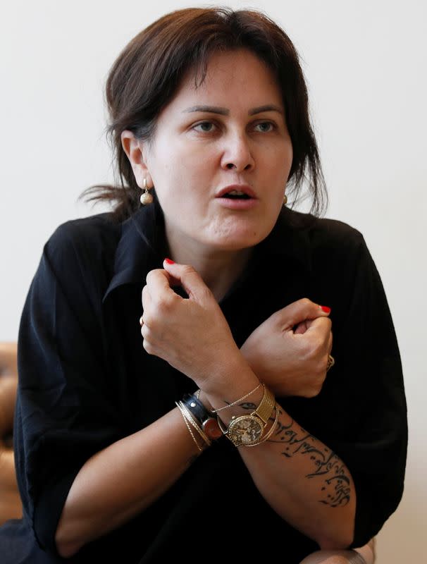 Afghan filmmaker Sahraa Karimi speaks during an interview with Reuters in Kyiv