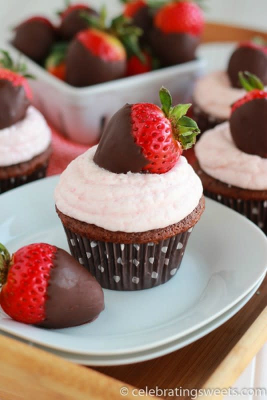 <p>Celebrating Sweets</p><p>Rich chocolate cupcakes topped with fresh strawberry frosting and garnished with a chocolate covered strawberry.</p><p><strong>Get the recipe: <a href="https://celebratingsweets.com/chocolate-dipped-strawberry-cupcakes/" rel="nofollow noopener" target="_blank" data-ylk="slk:Chocolate Dipped Strawberry Cupcakes;elm:context_link;itc:0;sec:content-canvas" class="link ">Chocolate Dipped Strawberry Cupcakes</a></strong></p>