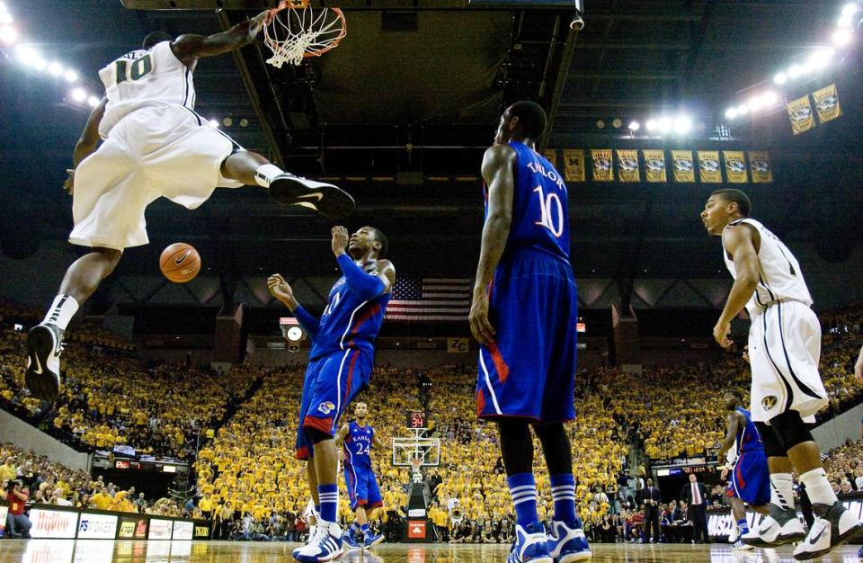 MU’s Ricardo Ratliffe threw down a vicious dunk over KU’s Thomas Robinson in the second half of the Tigers’ 74-71 win on Feb. 4, 2012 at Mizzou Arena in Columbia.