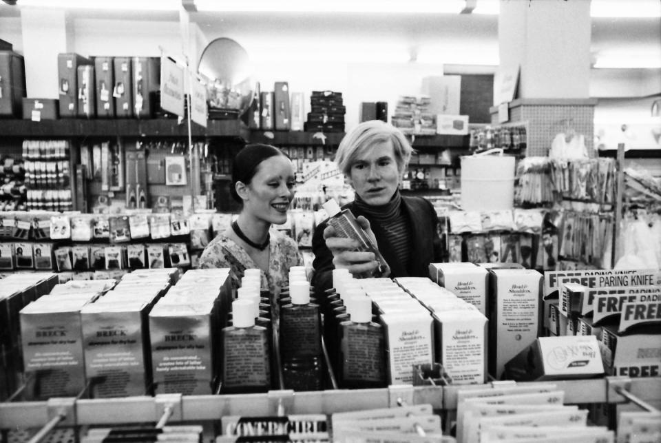 <p>Andy Warhol and actress and model Jane Forth shop for cosmetics in New York in 1970.</p>