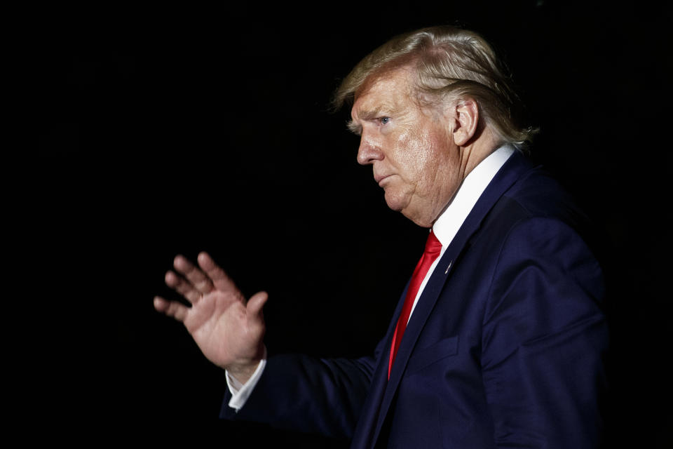 President Donald Trump waves as he arrives at the White House in Washington, Thursday, Aug. 1, 2019, as he returns from a campaign rally in Cincinnati. (AP Photo/Carolyn Kaster)