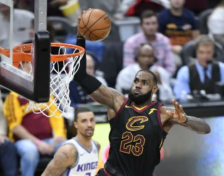 Dec 6, 2017; Cleveland, OH, USA; Cleveland Cavaliers forward LeBron James (23) drives to the basket against the Sacramento Kings in the second quarter at Quicken Loans Arena. Mandatory Credit: David Richard-USA TODAY Sports