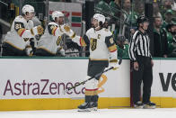 Vegas Golden Knights right wing Mark Stone (61) celebrates with the bench after scoring against the Dallas Stars in the first period in Game 5 of an NHL hockey Stanley Cup first-round playoff series in Dallas, Wednesday, May 1, 2024. (AP Photo/Tony Gutierrez)