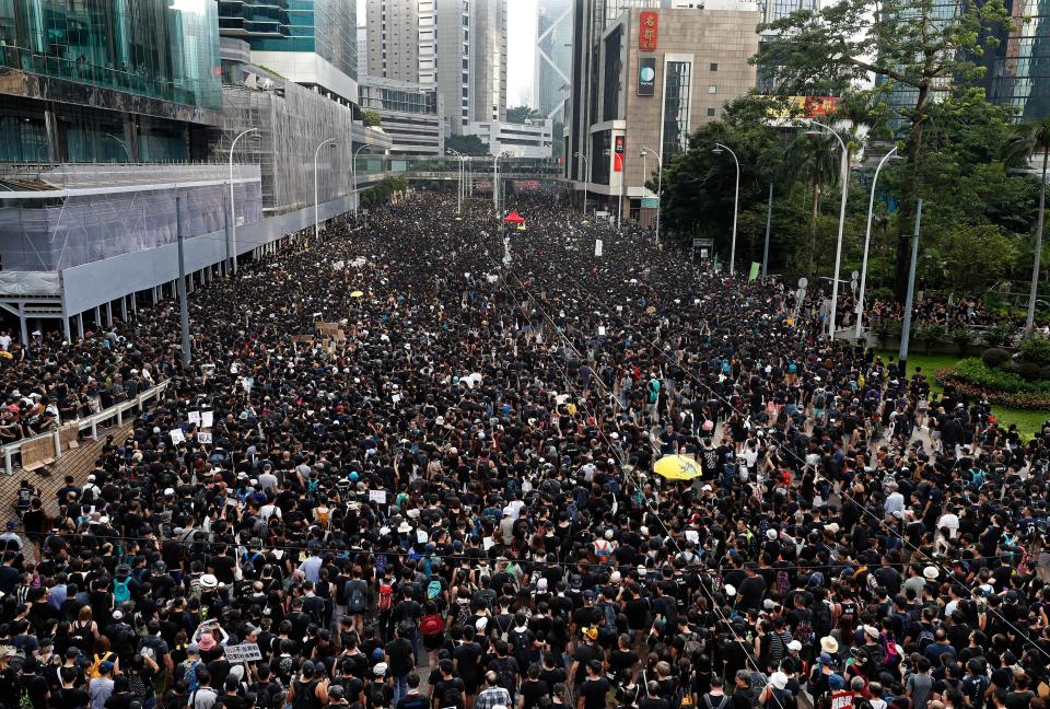 Protesters march on the streets against an extradition bill in Hong Kong on Sunday.