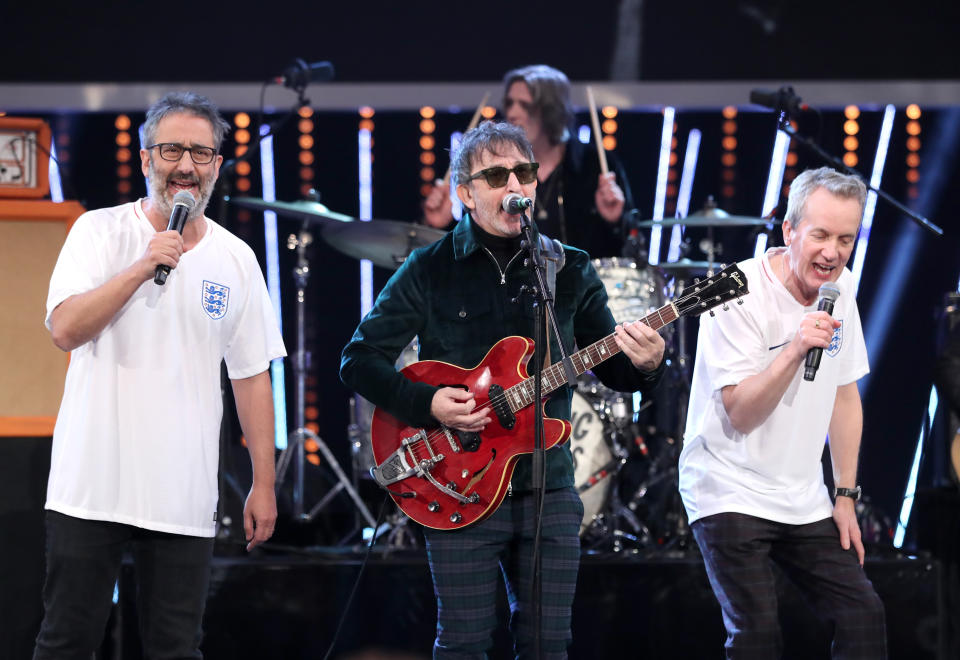 Ian Broudie (centre) of the Lightning Seeds performs with David Baddiel (left) and Frank Skinner during the BBC Sports Personality of the Year 2018 at Birmingham Genting Arena.