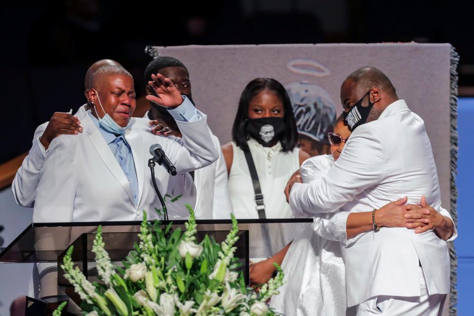 LaTonya Floyd, left, speaks during the funeral for her brother, George Floyd, on June 9, 2020, at The Fountain of Praise church in Houston.