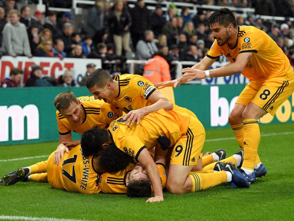 Wolves celebrate their late winning goal: Getty Images