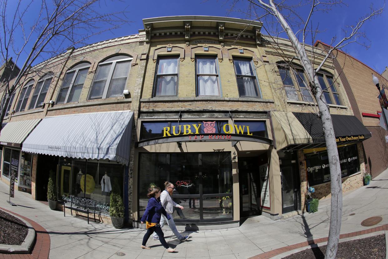 FILE - A view from the 400 block of North Main Street in downtown Oshkosh in May 2022. Pictured is the Ruby Owl Tap Room.