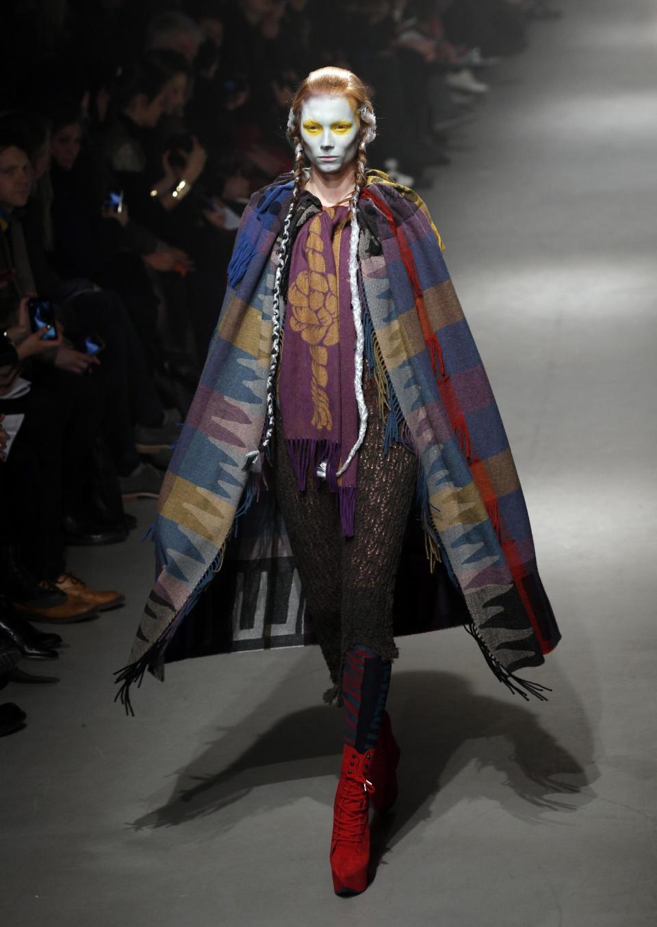 A model wears a creation by designer Vivienne Westwood for her Fall/Winter 2013-2014 ready to wear collection, in Paris, Saturday, March 2, 2013. (AP Photo/Christophe Ena)