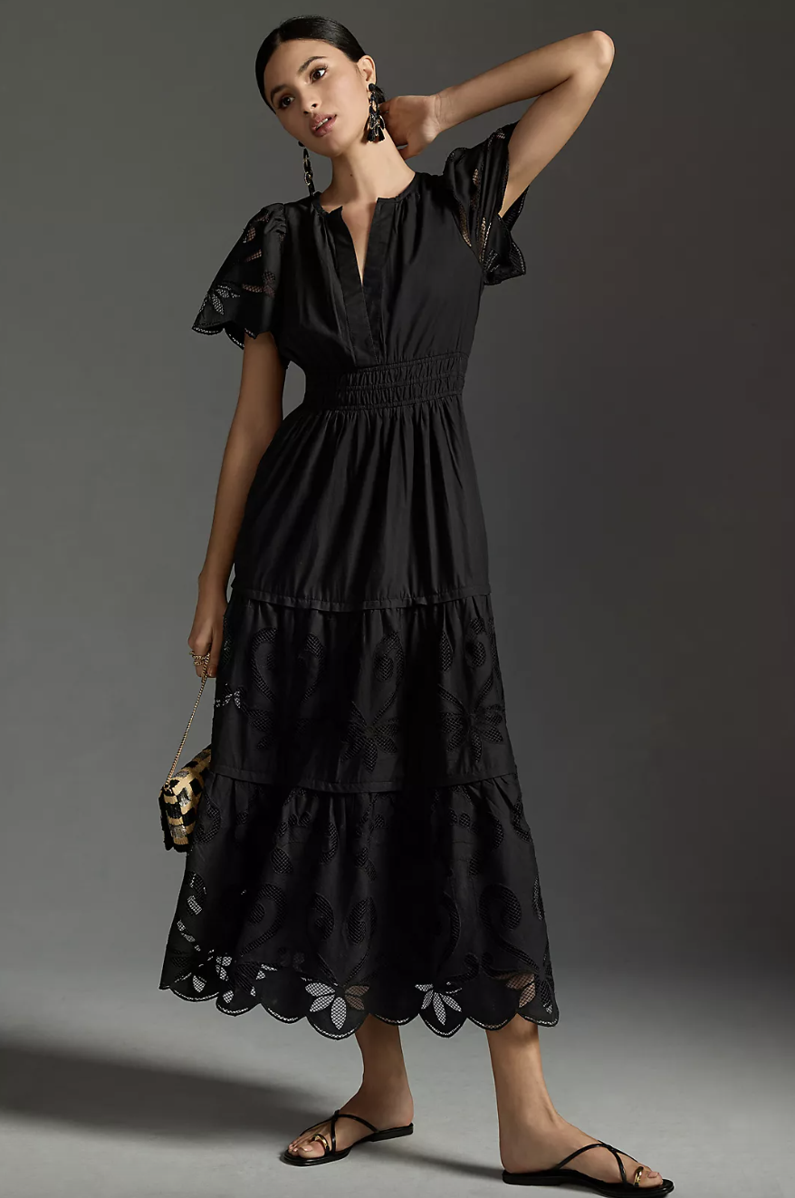 model wearing black The Somerset Maxi Dress: Cutwork Edition (photo via Anthropologie)