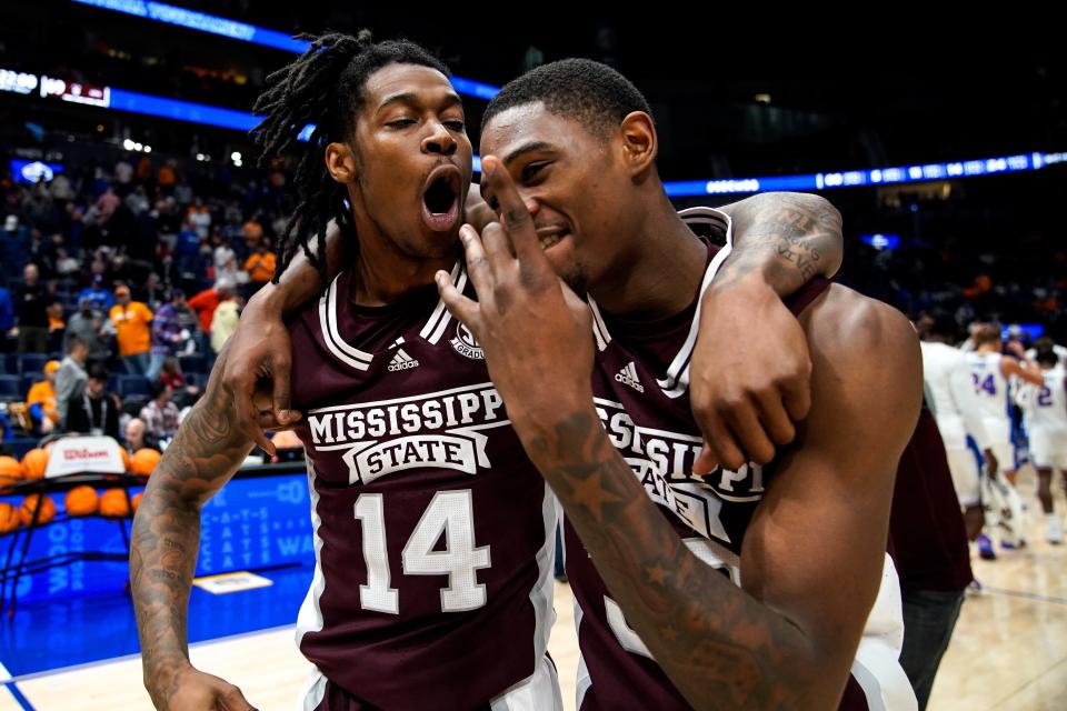 Mississippi State forward Tyler Stevenson (14) and guard Shawn Jones Jr. (30) celebrate their victory against Florida  in a second round SEC Men’s Basketball Tournament game at Bridgestone Arena in Nashville, Tenn., Thursday, March 9, 2023.