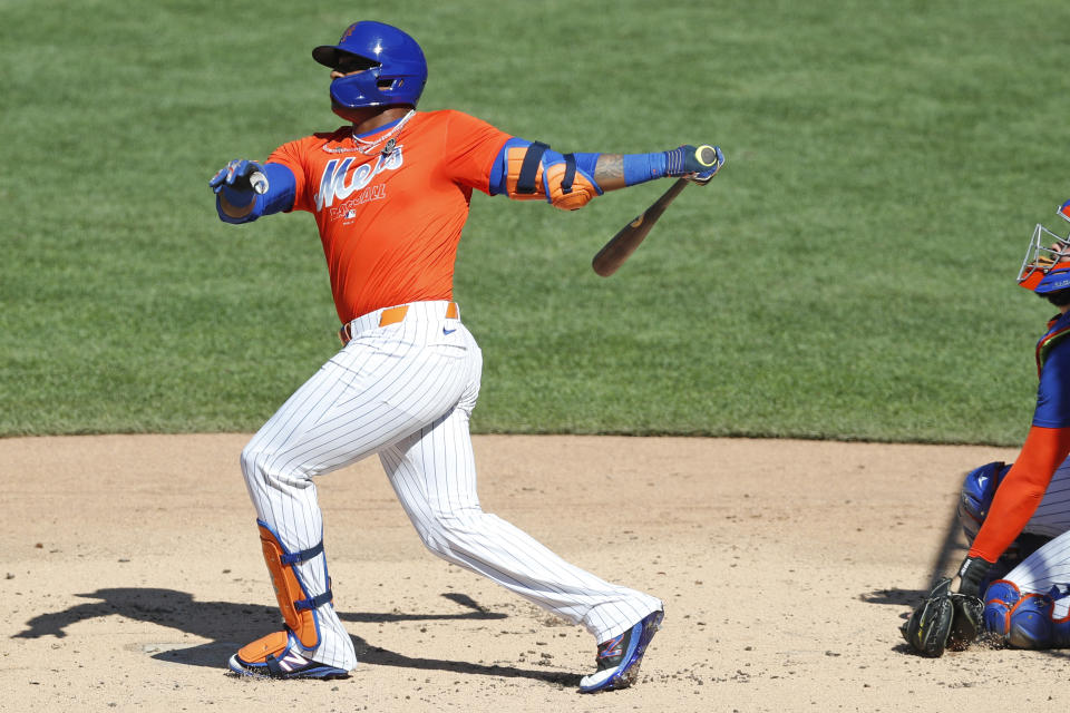 New York Mets' Yoenis Cespedes bats in a simulated game, part of the Mets summer baseball training camp workout at Citi Field, Thursday, July 9, 2020, in New York. (AP Photo/Kathy Willens)