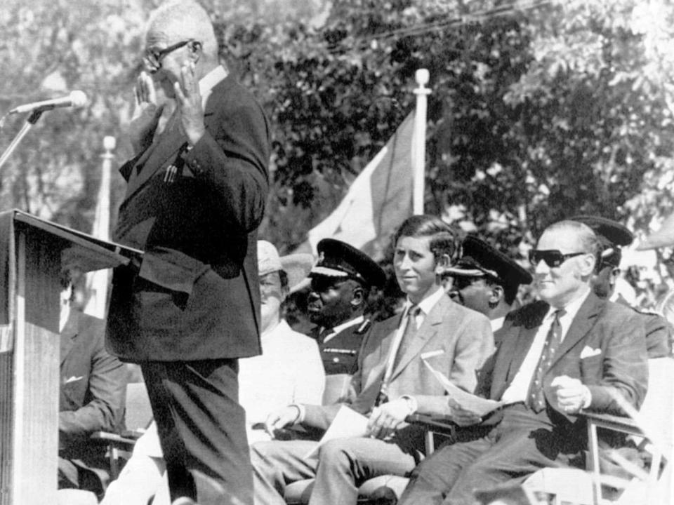 Britain's Prince Charles, the Prince of Wales, second right, and Sir John Paul, Governor and Commander-in-Chief of the Bahamas, listen to Bishop Alvin S. Moss, General Overseer of the Church of God of Prophecy, during a Thanksgiving Service, in Nassau, Bahamas, on July 8, 1973, as part of the Bahamas Independence celebrations.