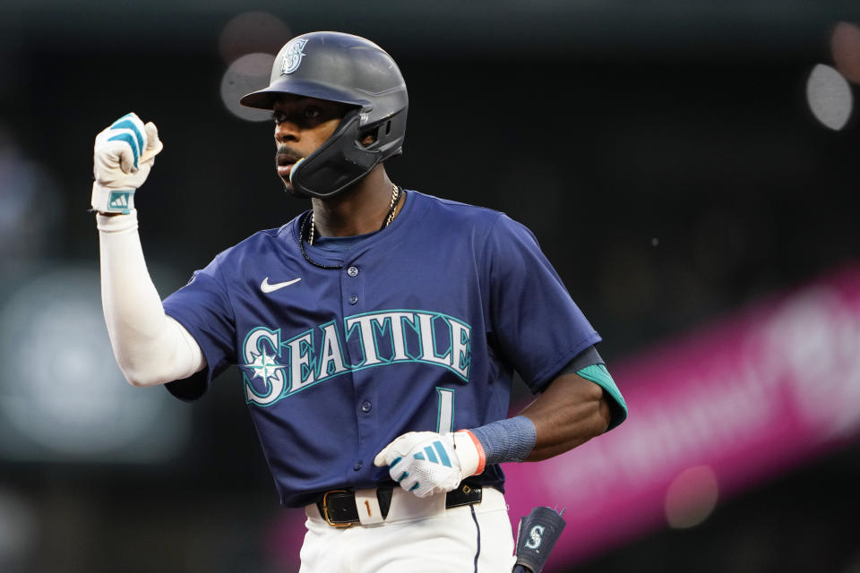 Seattle Mariners' Ryan Bliss reacts after hitting a single against the Chicago White Sox during the eighth inning of a baseball game Monday, June 10, 2024, in Seattle. (AP Photo/Lindsey Wasson)