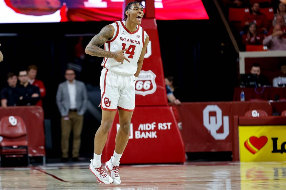 Oklahoma forward Jalon Moore (14) celebrates after shooting a 3-pointer in the first half during an NCAA basketball game between University of Oklahoma (OU) and Iowa State at the Lloyd Noble Center in Norman, Okla., on Saturday, Jan. 6, 2024.