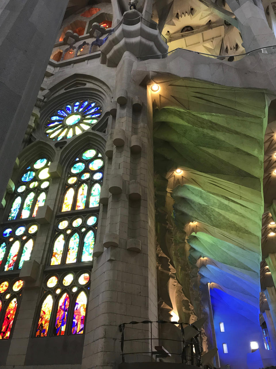 This Oct. 14, 2019 photo shows colored light filtering through the stained-glass windows of Basílica de Sagrada Família, Anton Gaudí’s unfinished landmark, in Barcelona, Spain. (Courtney Bonnell via AP)