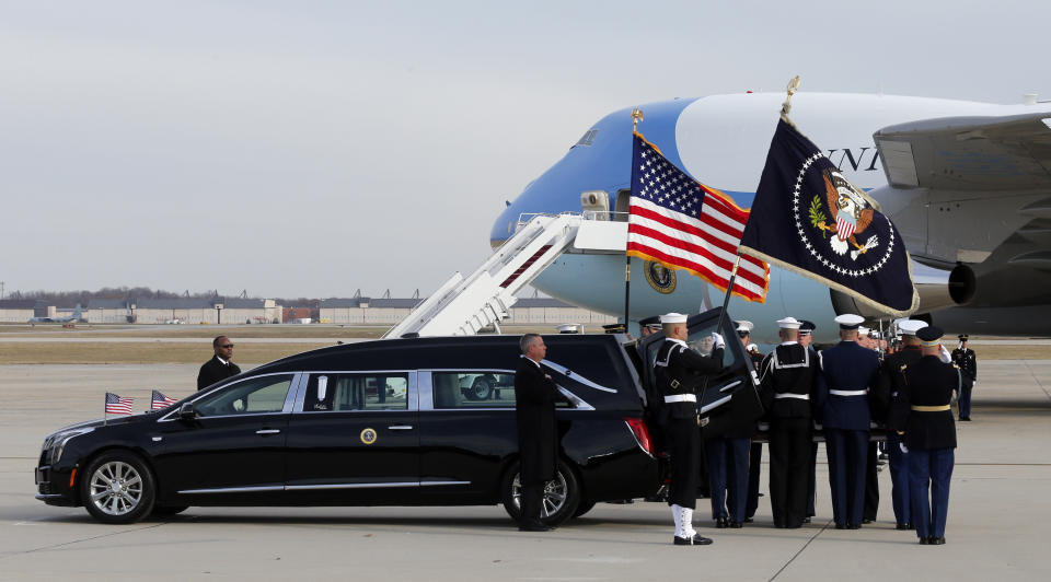 The flag-draped casket of former President George H.W. Bush is carried by a joint services military honor guard during a departure ceremony at Andrews Air Force Base in Maryland on Wednesday. (Photo: ASSOCIATED PRESS)