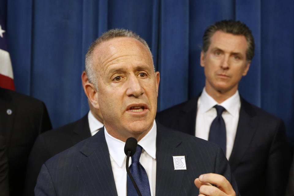 FILE — In this March 20, 2019, file photo, Sacramento Mayor Darrell Steinberg speaks at a news conference held by Gov. Gavin Newsom, right, in Sacramento, Calif. Steinberg is a possible candidate to be named California's next Attorney General after Xavier Becerra, was appointed to join the Biden Administration as Secretary of Health and Human Services. (AP Photo/Rich Pedroncelli, File)