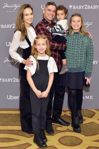 Stefanie Keenan/Getty Jessica Alba (L) and Cash Warren with their kids