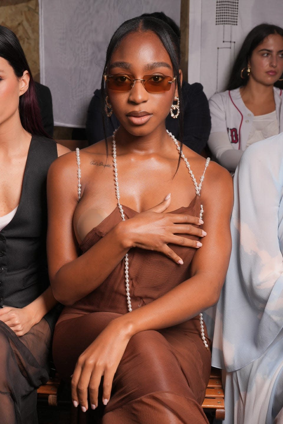 normani see through brown dress wardrobe malfunction moschino milan fashion week rtw spring 2025 front row