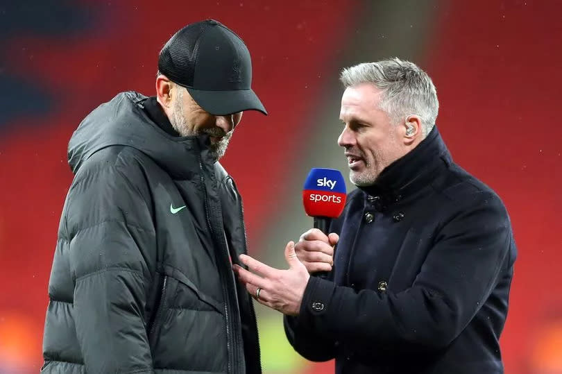 Liverpool boss Jürgen Klopp with former defender Jamie Carragher