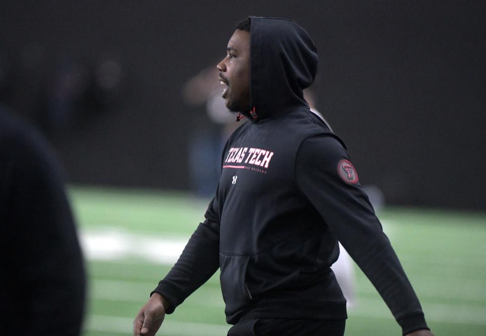 Texas Tech graduate assistant coach Jah'Shawn Johnson gives instruction during a spring-practice session this month. Johnson, a four-year starting safety for the Red Raiders from 2015-18, is in his second year on the staff.