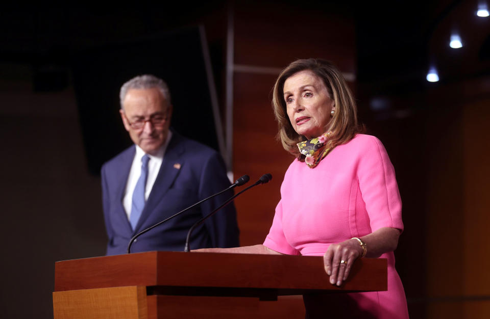 Image: U.S. House Speaker Nancy Pelosi (D-CA), speaks next to Senate Minority Leader Chuck Schumer (D-NY), during a news conference on Capitol Hill in Washington (Jonathan Ernst / Reuters)