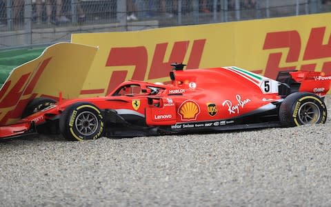 22nd July 2018, Hockenheimring, Hockenheim, Germany; German Formula One Grand Prix, Race Day; Scuderia Ferrari, Sebastian Vettel crashes out of the race while in the lead when rain slicked the track  - Credit: action plus