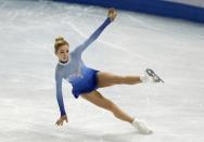 Gracie Gold of the U.S. falls during the figure skating women's free skating program at the 2014 Sochi Winter Olympics, February 20, 2014. REUTERS/Issei Kato (RUSSIA - Tags: OLYMPICS SPORT FIGURE SKATING)