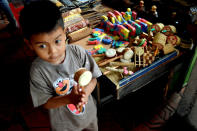 This is mine: A kid with a vintage wooden toys. playing and having fun is very simple thing in the past. (