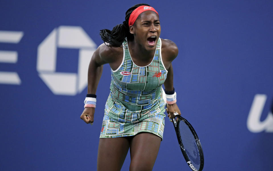 Coco Gauff. of the United States, celebrates after defeating Timea Babos, of Hungary, during the second round of the U.S. Open tennis tournament in New York, Thursday, Aug. 29, 2019. (AP Photo/Charles Krupa)