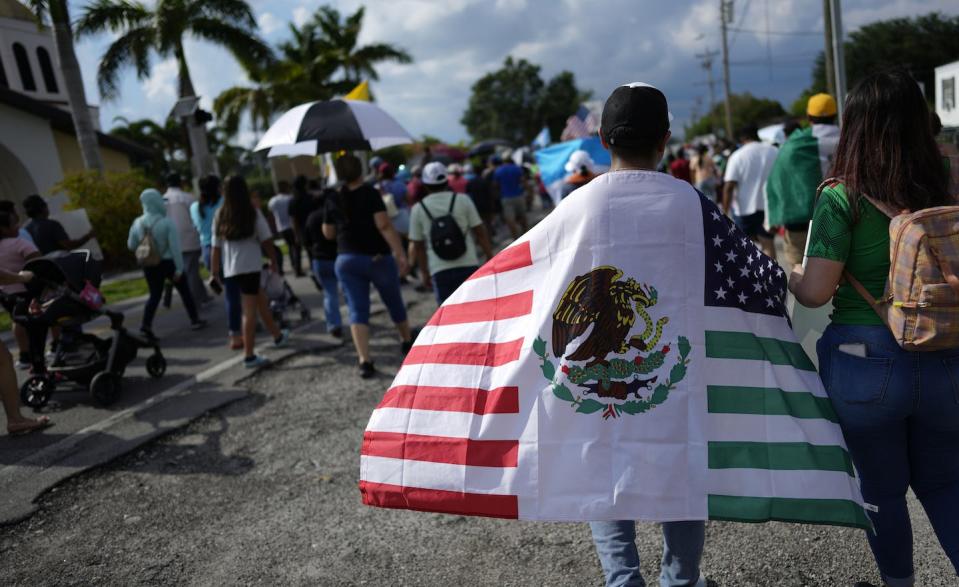 Hundreds protested peacefully in Immokalee, Fla., against a state law enacted in 2023 that imposes restrictions on undocumented immigrants. <a href="https://newsroom.ap.org/detail/Florida%20Day%20Without%20Immigrants/f748660925de4eb49e9de66ebcb24178?Query=immigrant%20workers&mediaType=photo&sortBy=arrivaldatetime:desc&dateRange=Anytime&totalCount=1114&currentItemNo=9" rel="nofollow noopener" target="_blank" data-ylk="slk:AP Photo/Rebecca Blackwell;elm:context_link;itc:0;sec:content-canvas" class="link ">AP Photo/Rebecca Blackwell</a>