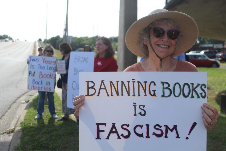 A "Bring Back Our Books Rally" formed outside of Pensacola's J.E. Hall Center Tuesday prior to the Escambia County School Board meeting in support of returning challenged school library books to the shelves.