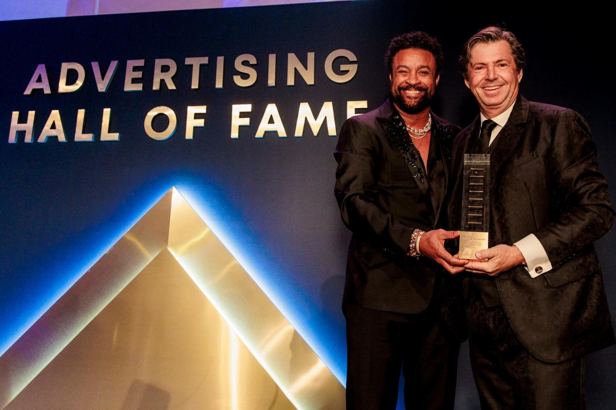 Olivier Francois, right, stands with his friend, the musician Shaggy, at the award ceremony for the 73rd Annual Advertising Hall of Fame presented by the American Advertising Federation.