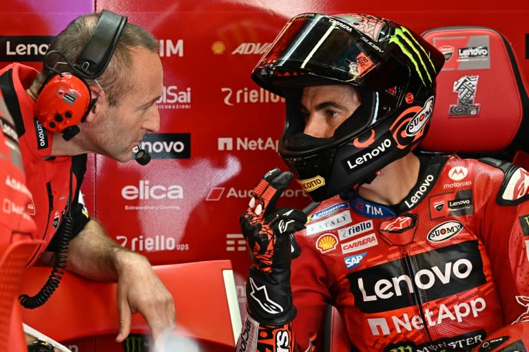 Speed king: Francesco Bagnaia speaks with a Ducati mechanic during practice (JAVIER SORIANO)