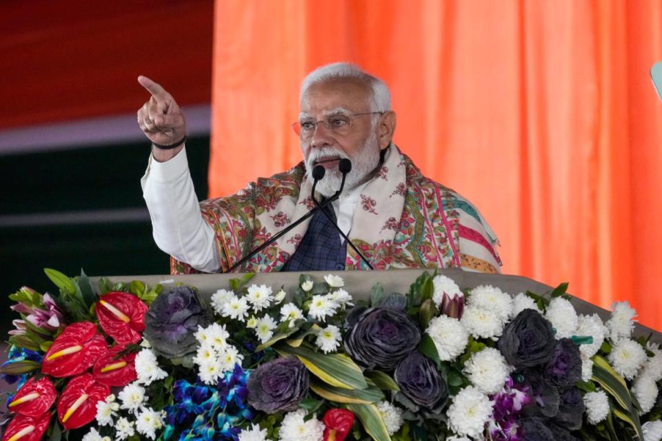 Indian Prime Minister Narendra Modi addresses a public rally at the Moulana Azad Stadium during which he inaugurated several projects in Jammu in February (AP)